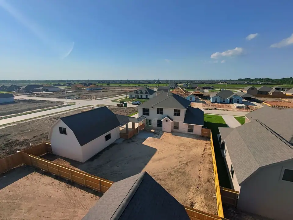 Aerial view of the home and neighboring homesites at 2213 Ensenada Drive, League City, Texas