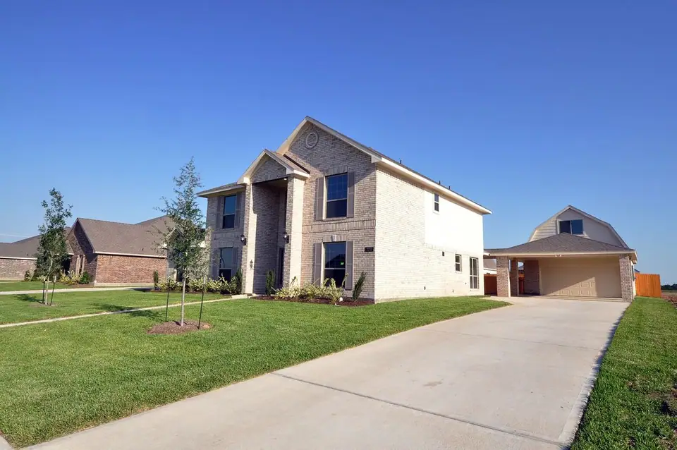 Driveway beside the home and garage at 2213 Ensenada Drive, League City, Texas