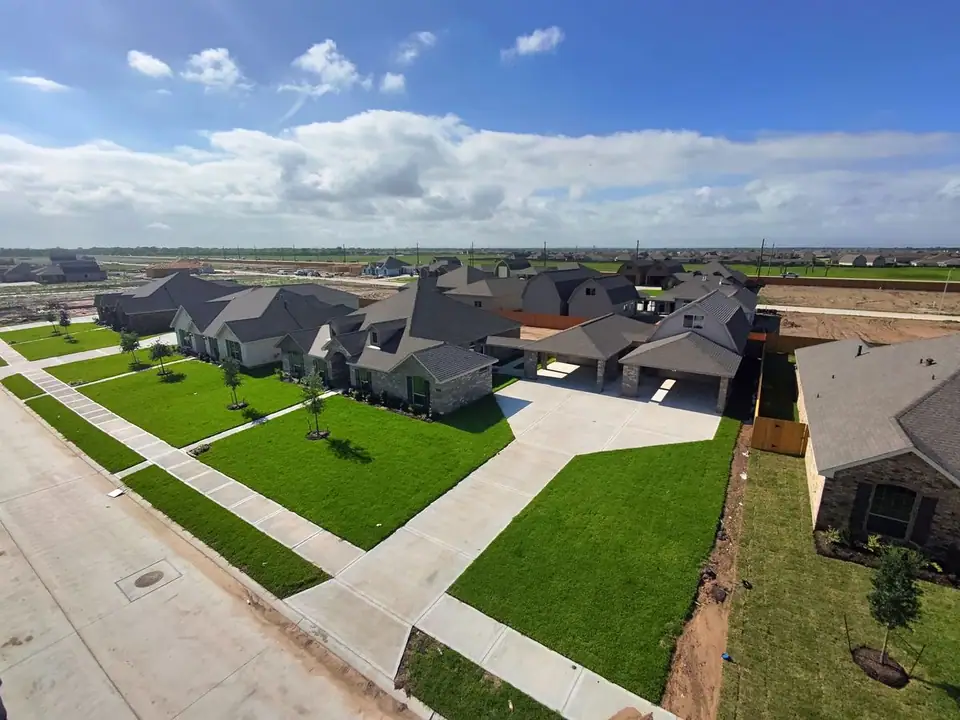 Aerial view of the home, driveway and neighborhood at 2238 Ensenada Drive, League City, Texas