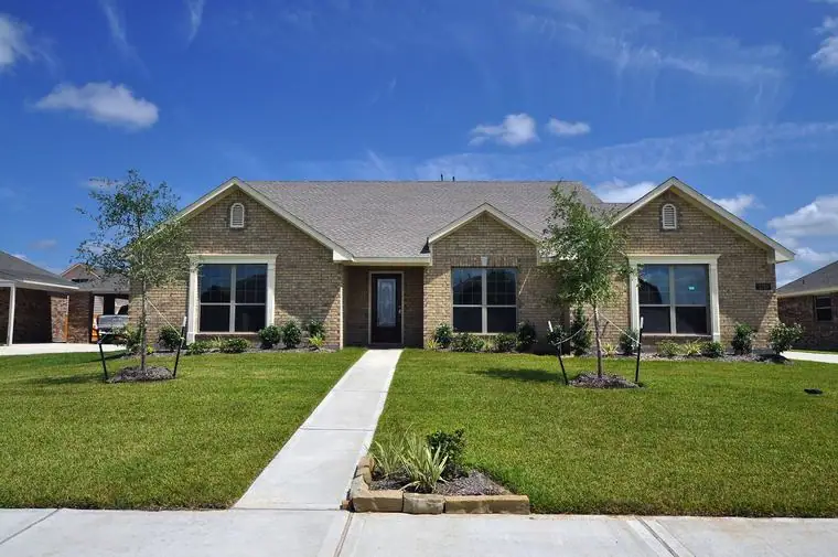 Brick front exterior and front walkway at 2210 Fortuna Drive, League City, Texas