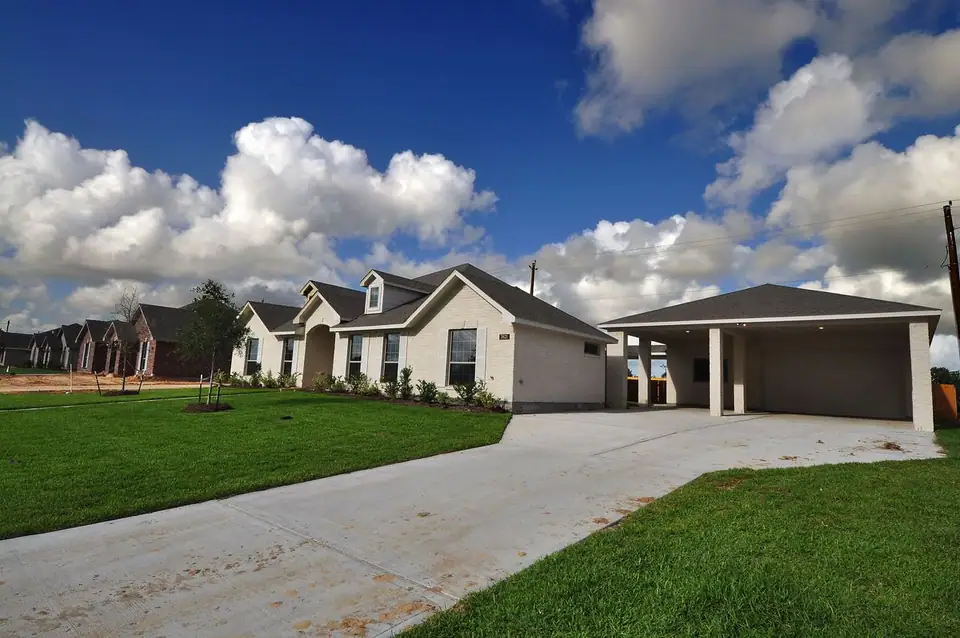Home, covered parking and driveway at 3821 Verde River Road, League City, Texas