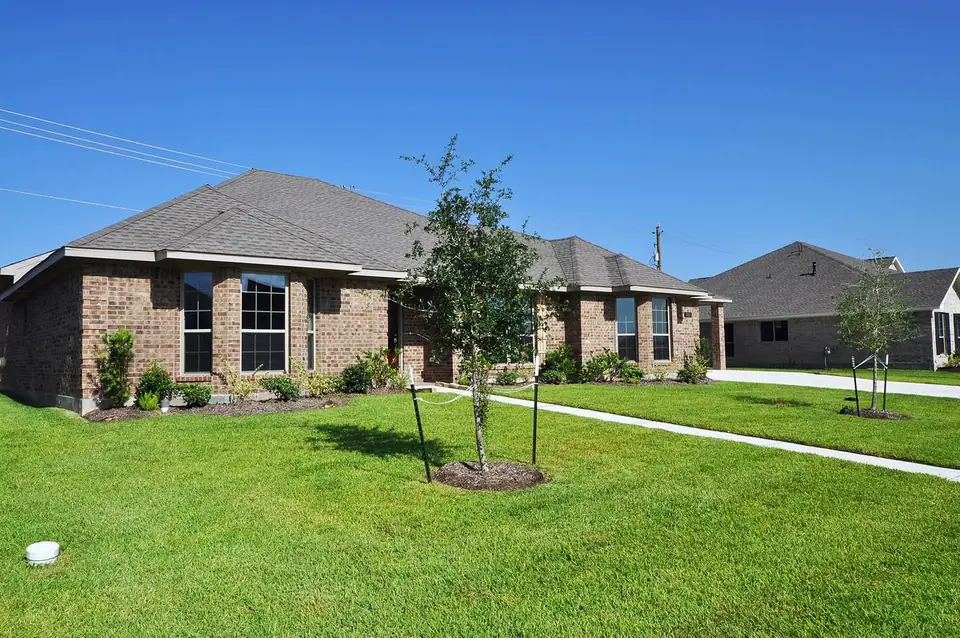 Angled front view of the brick home at 3805 Verde River Road, League City, Texas