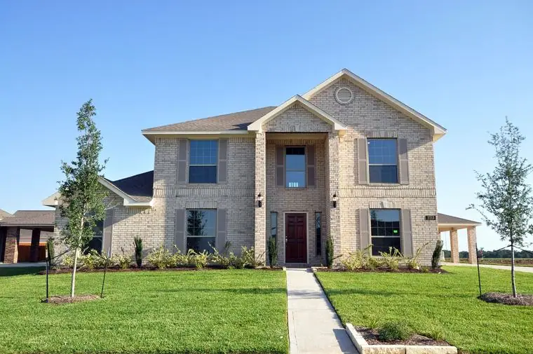 Two-story home with a covered front entrance at 2213 Ensenada Drive, League City, Texas